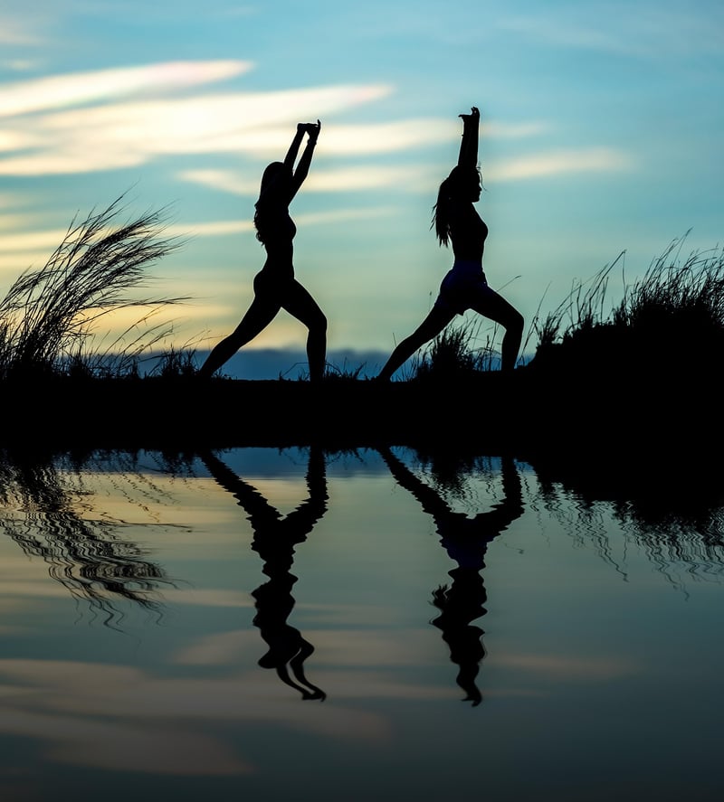 Woman practicing yoga outdoors